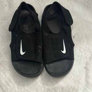 Nike Black Sandals with Velcro Straps and Water-Resistant Design